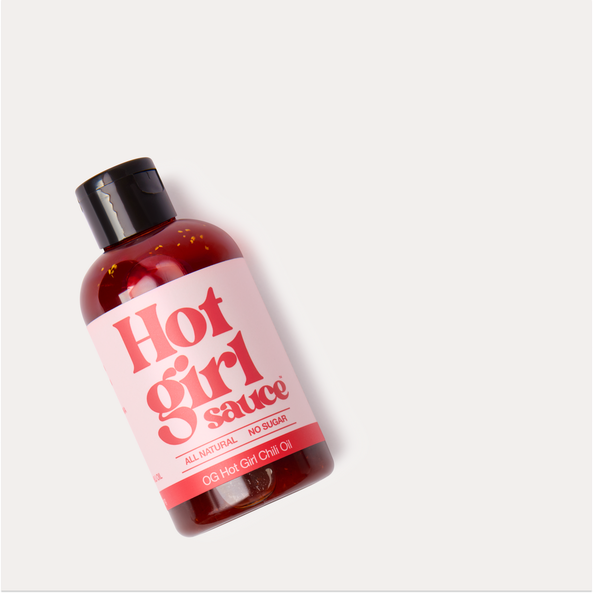 Bottle of OG Hot Girl Squeezable Chili Oil with squeeze lid - Hotgirlsauce chili oil - chili sauce - hot sauce