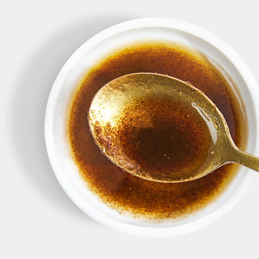 Vibrant, silky smooth Habanero Hot Girl Chili Oil in a saucer - Hotgirlsauce chili oil - chili sauce - hot sauce